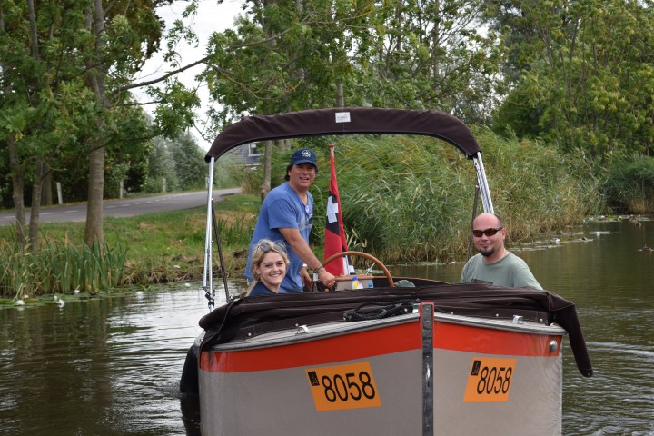 Three people on a boat